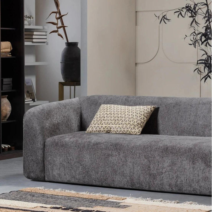 Sloping 3-seater velvet sofa