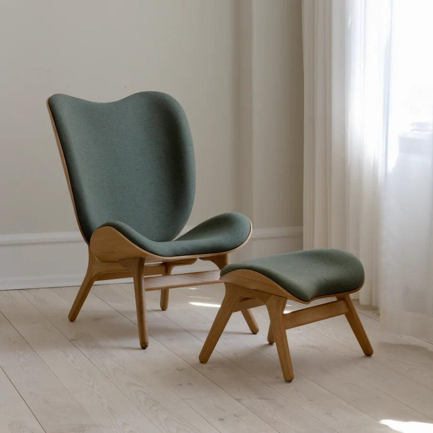 The Conversation Piece fabric high chair with natural frame