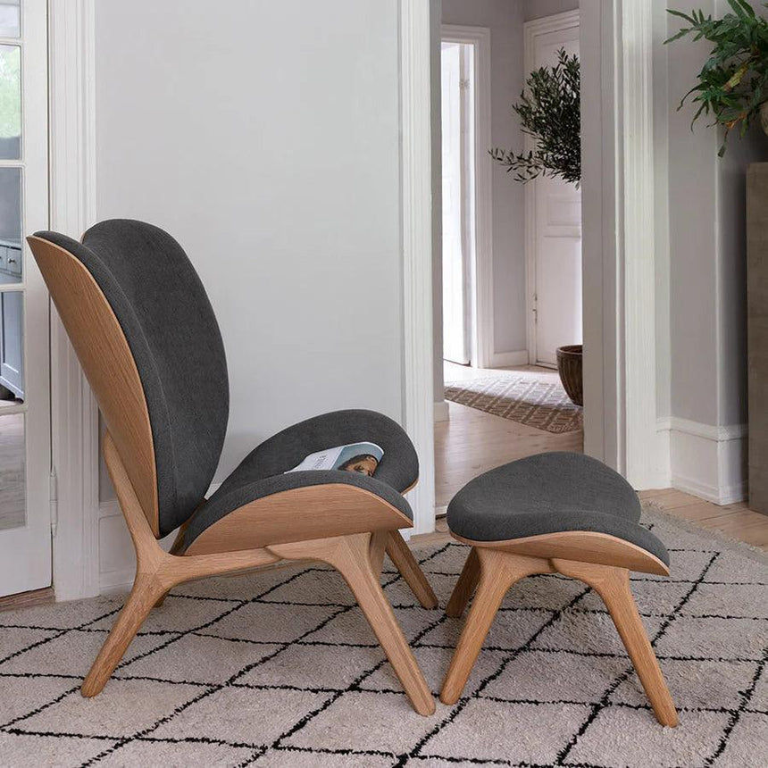 The Conversation Piece fabric footstool with natural frame