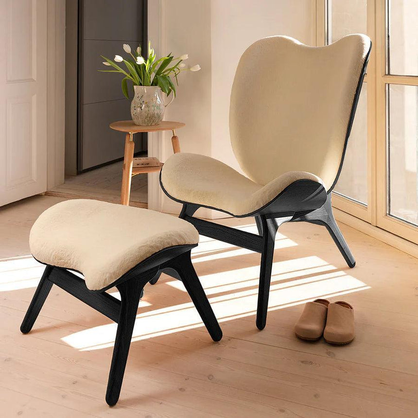 The Conversation Piece Faux Fur Footstool with Black Frame