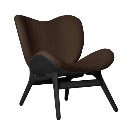 A Conversation Piece műszőrme fotel fekete kerettel