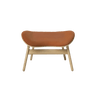 The Conversation Piece leather footstool with natural frame