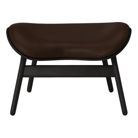 The Conversation Piece leather footstool with black frame