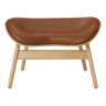 The Conversation Piece leather footstool with natural frame