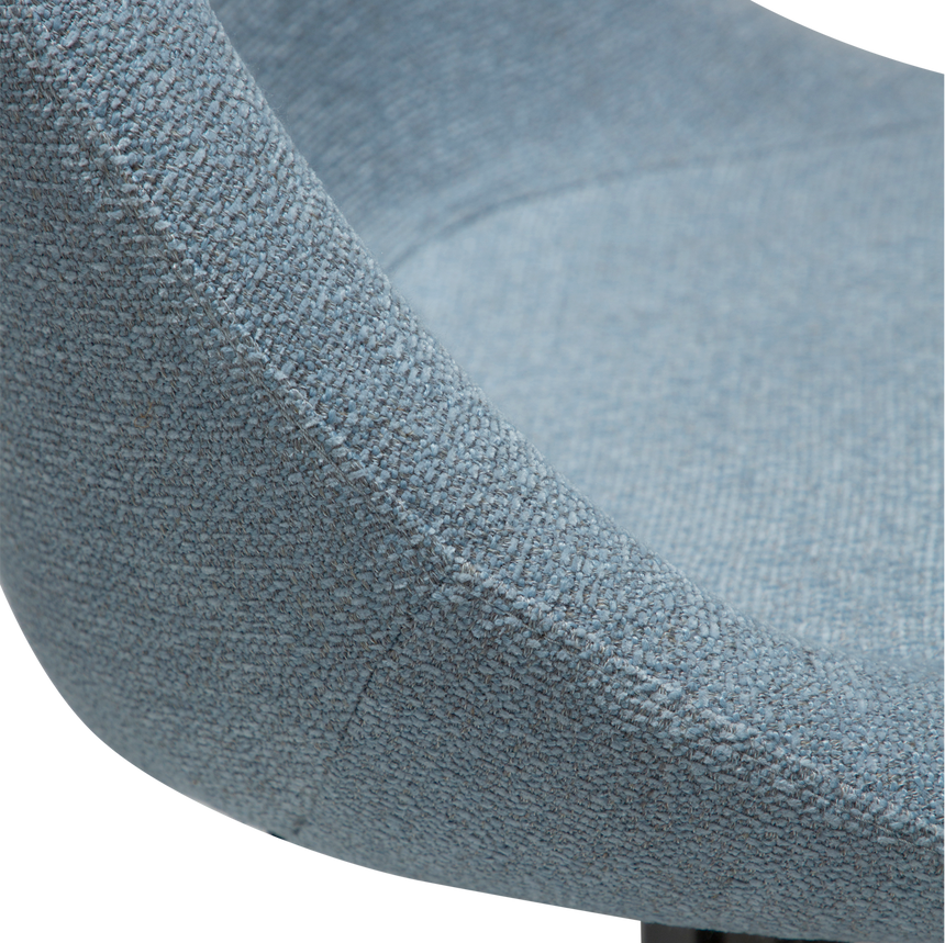 Dolo bouclé swivel chair with antique legs