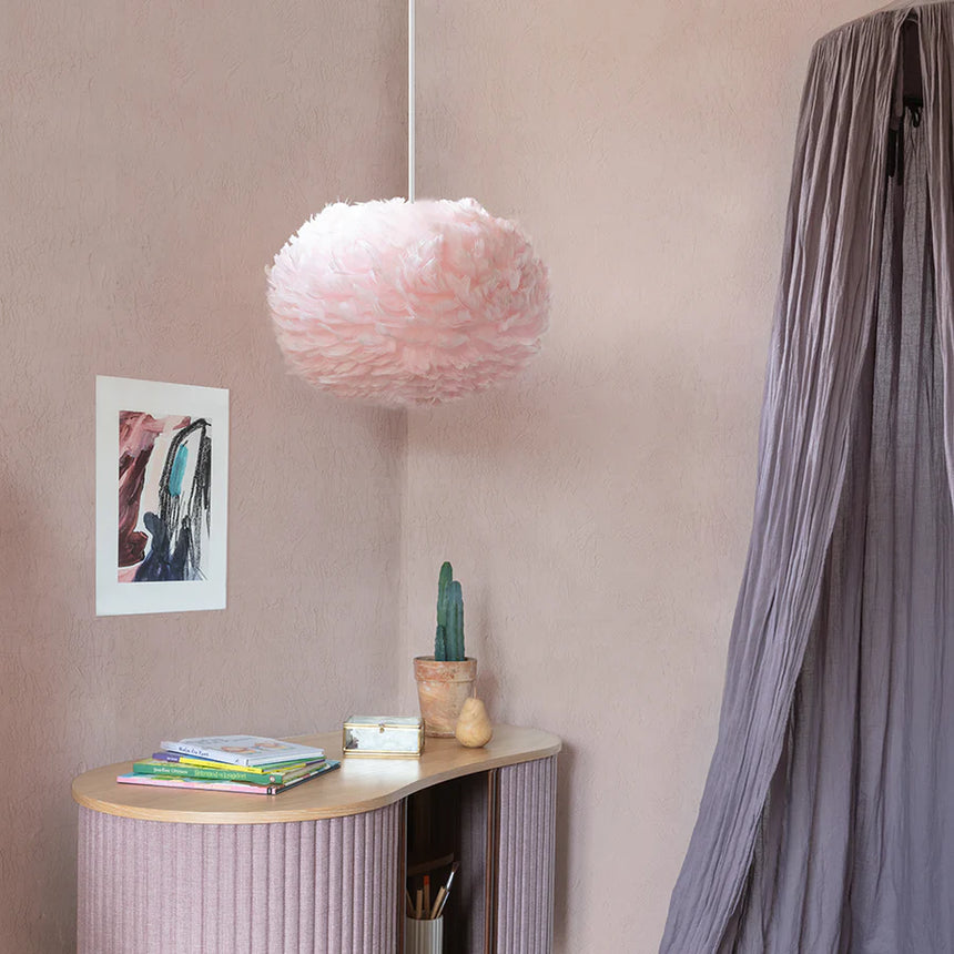 The Conversation Piece fabric armchair with natural frame