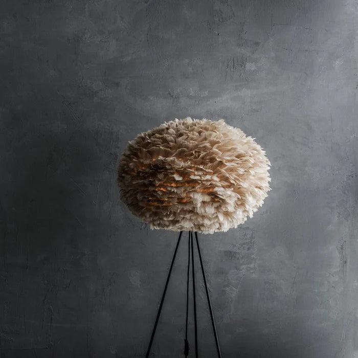 The Conversation Piece fabric armchair with natural frame
