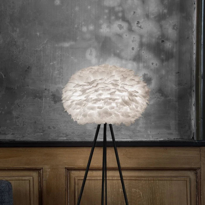 The Conversation Piece fabric armchair with natural frame