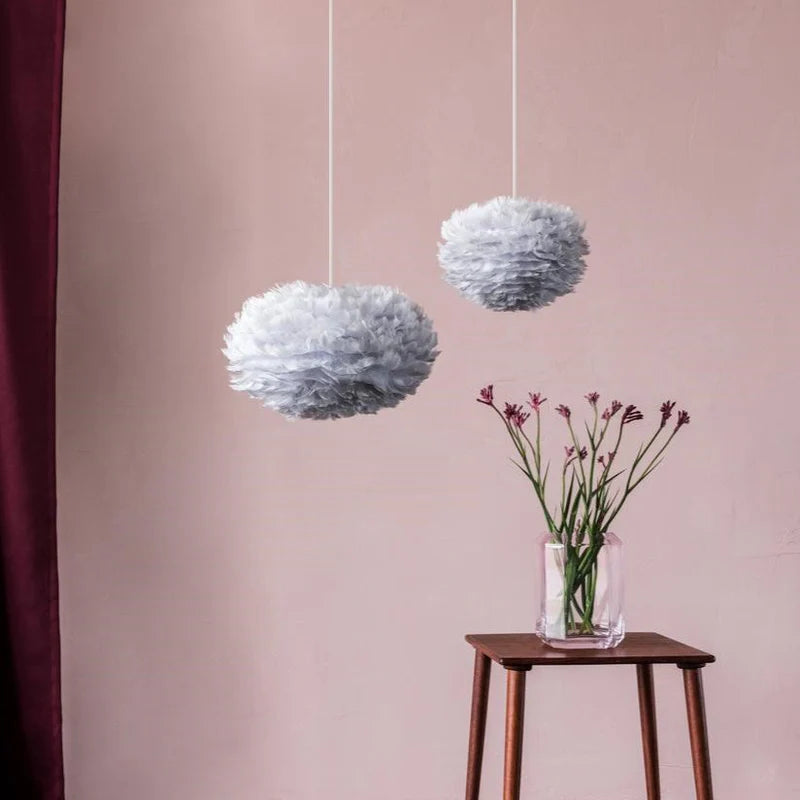 The Conversation Piece fabric armchair with natural frame