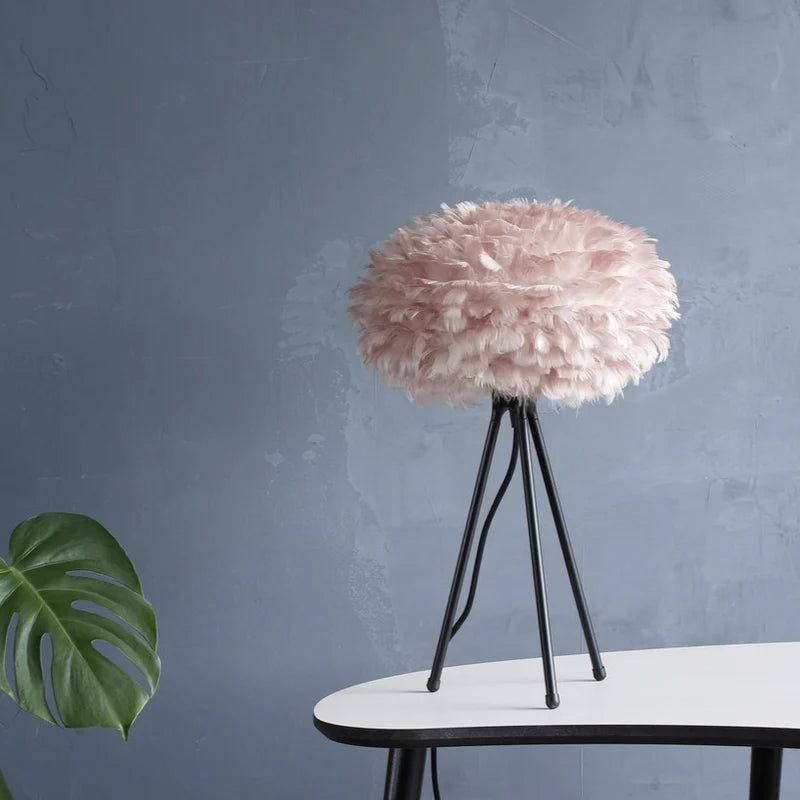 The Conversation Piece fabric armchair with natural frame