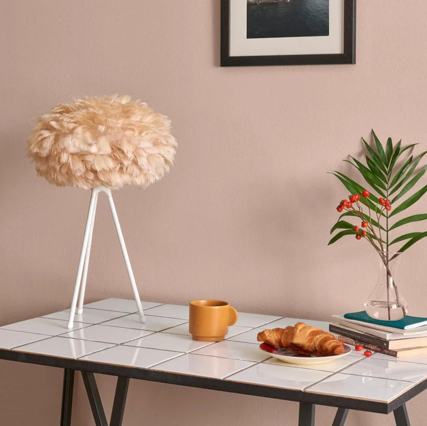 The Conversation Piece fabric armchair with natural frame