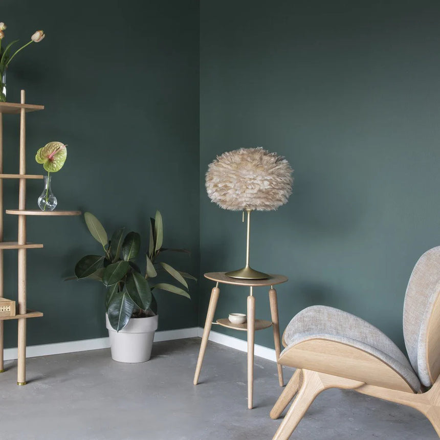 The Conversation Piece fabric armchair with natural frame