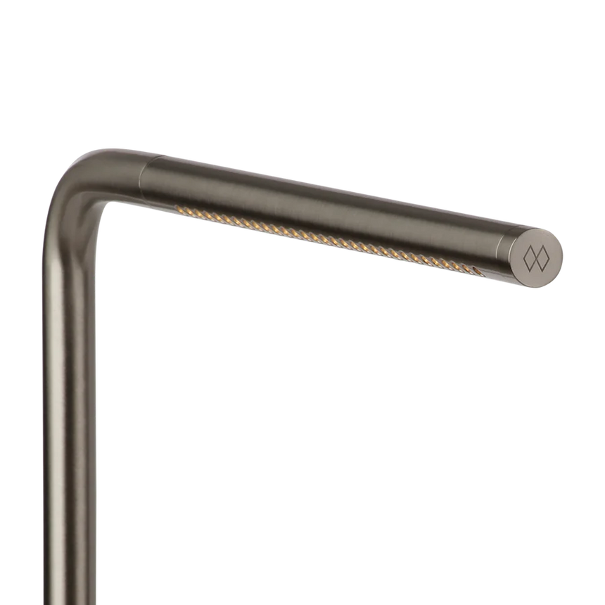 The Conversation Piece fabric armchair with natural frame