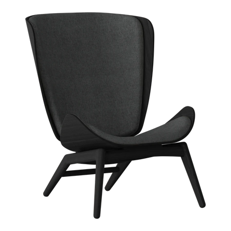 The Conversation Piece fabric armchair with natural frame