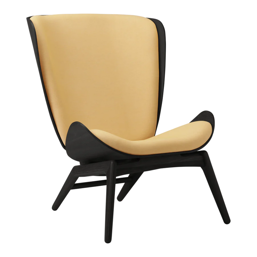 The Conversation Piece fabric armchair with natural frame