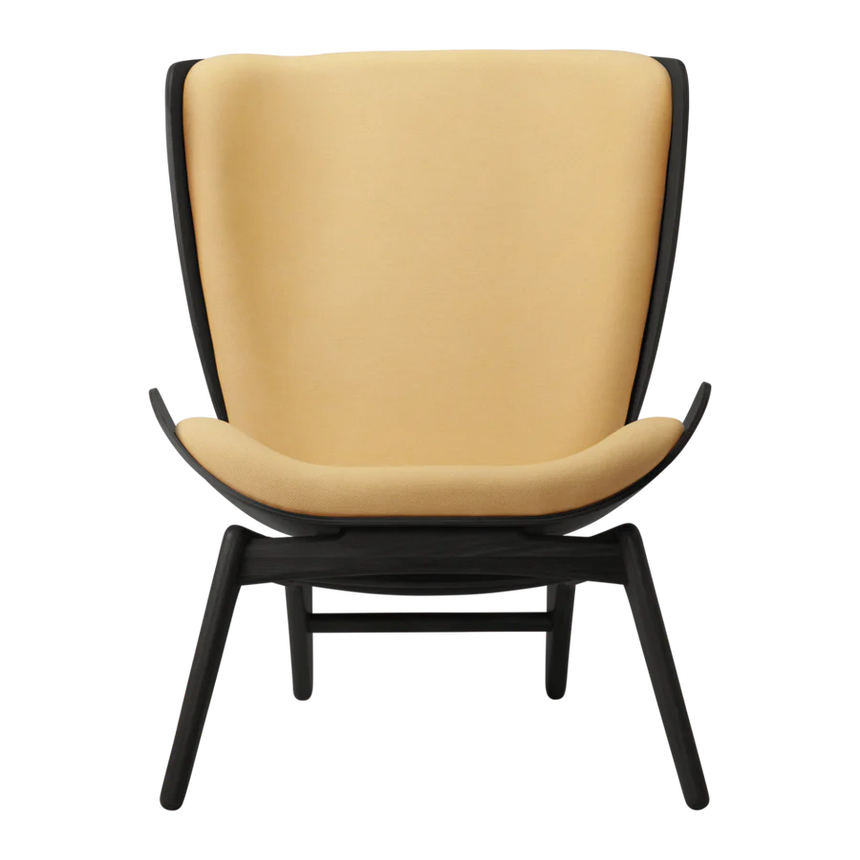 The Conversation Piece fabric armchair with natural frame