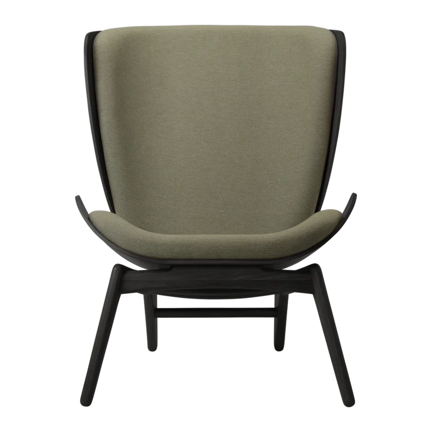 The Conversation Piece fabric armchair with natural frame