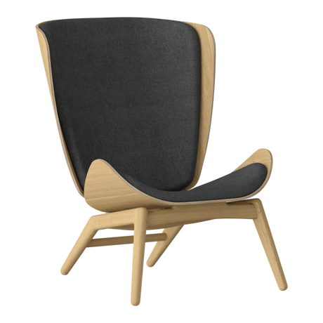 The Conversation Piece fabric armchair with natural frame