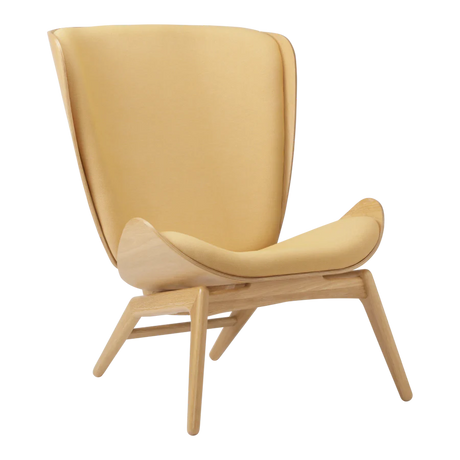The Conversation Piece fabric armchair with natural frame