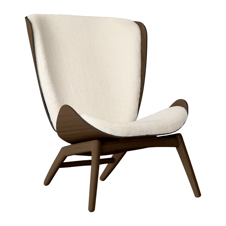 The Conversation Piece fabric armchair with natural frame