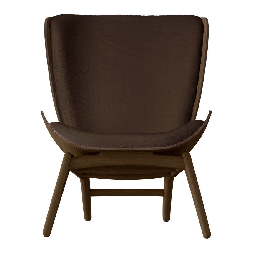 The Conversation Piece fabric armchair with natural frame