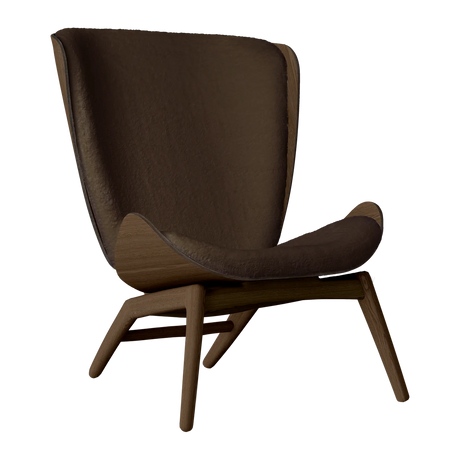 The Conversation Piece fabric armchair with natural frame