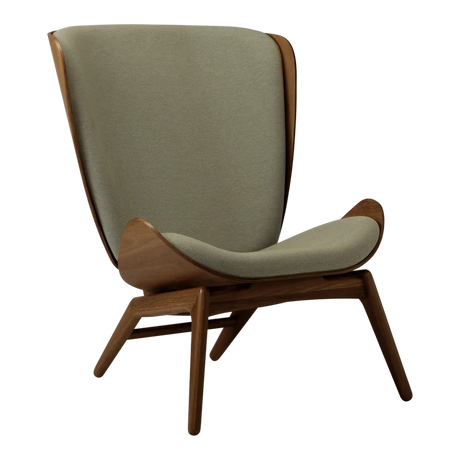 The Conversation Piece fabric armchair with natural frame