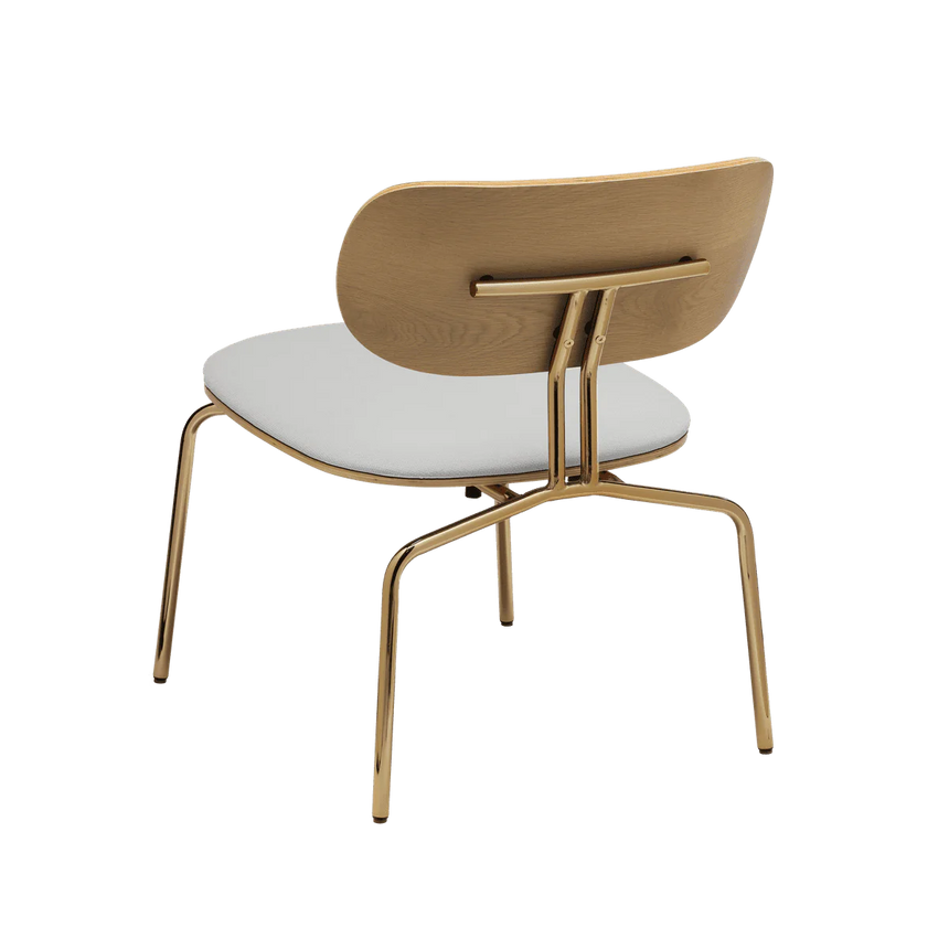 The Conversation Piece fabric armchair with natural frame