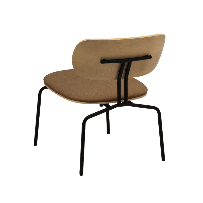 The Conversation Piece fabric armchair with natural frame