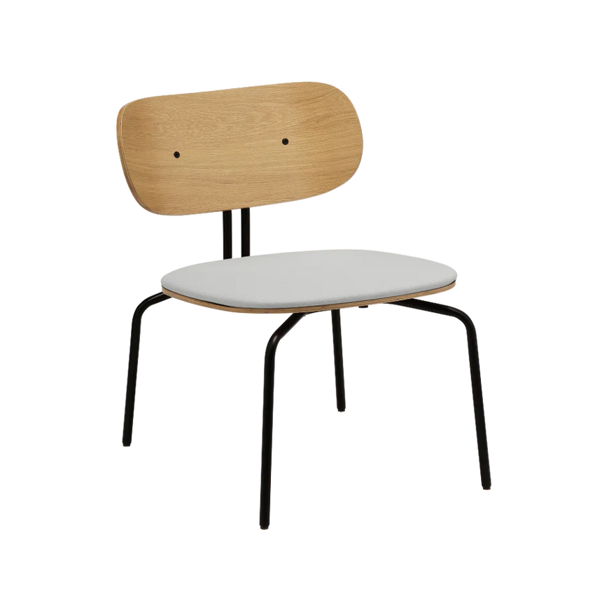 The Conversation Piece fabric armchair with natural frame