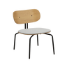 The Conversation Piece fabric armchair with natural frame
