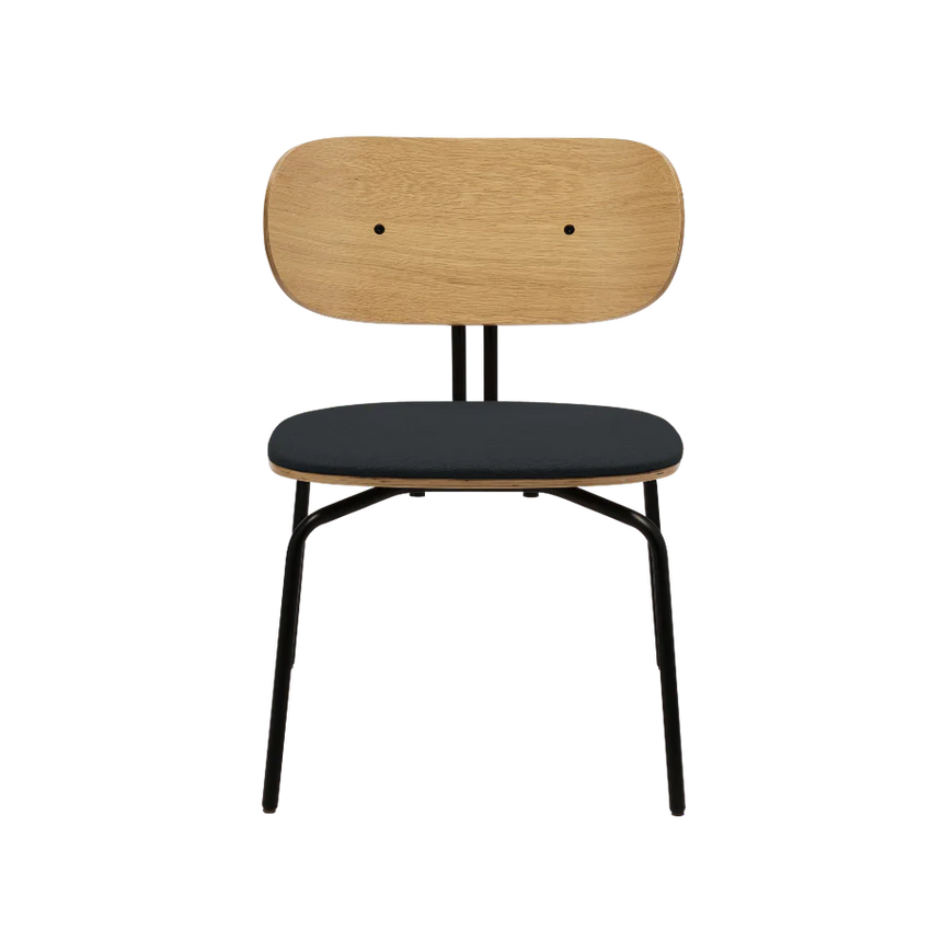 The Conversation Piece fabric armchair with natural frame