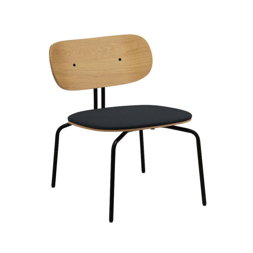 The Conversation Piece fabric armchair with natural frame