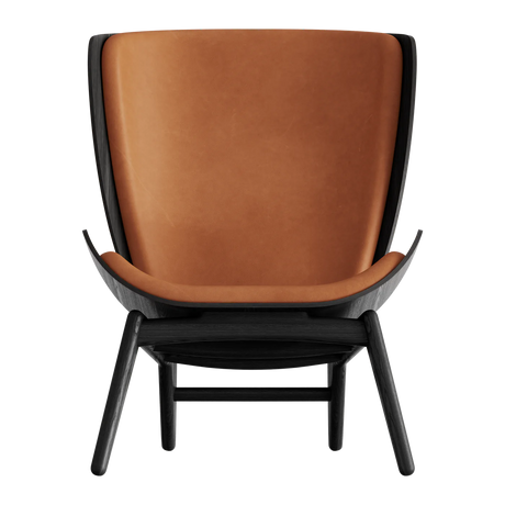 The Conversation Piece leather armchair with natural frame