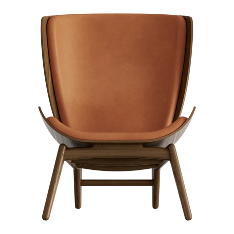 The Conversation Piece leather armchair with natural frame