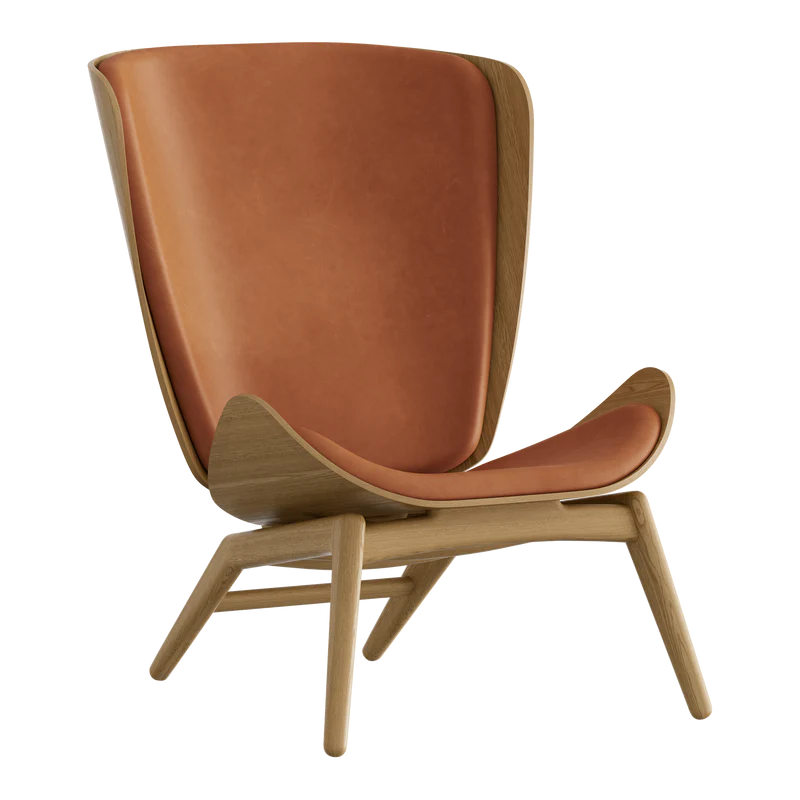 The Conversation Piece leather armchair with natural frame