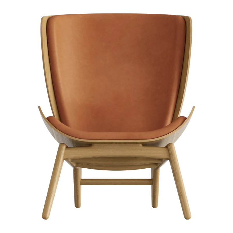 The Conversation Piece leather armchair with natural frame