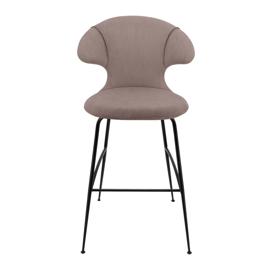 The Conversation Piece fabric armchair with natural frame