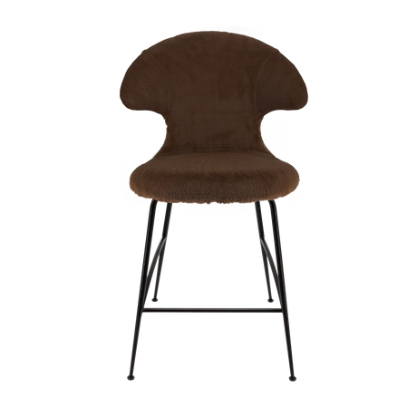 The Conversation Piece fabric armchair with natural frame