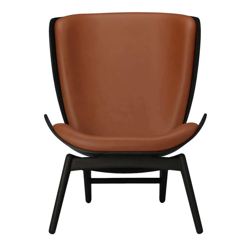 The Conversation Piece leather armchair with natural frame