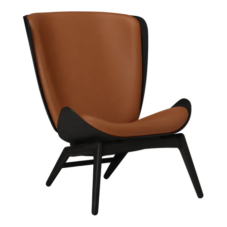 The Conversation Piece leather armchair with natural frame