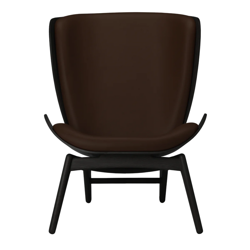 The Conversation Piece leather armchair with natural frame