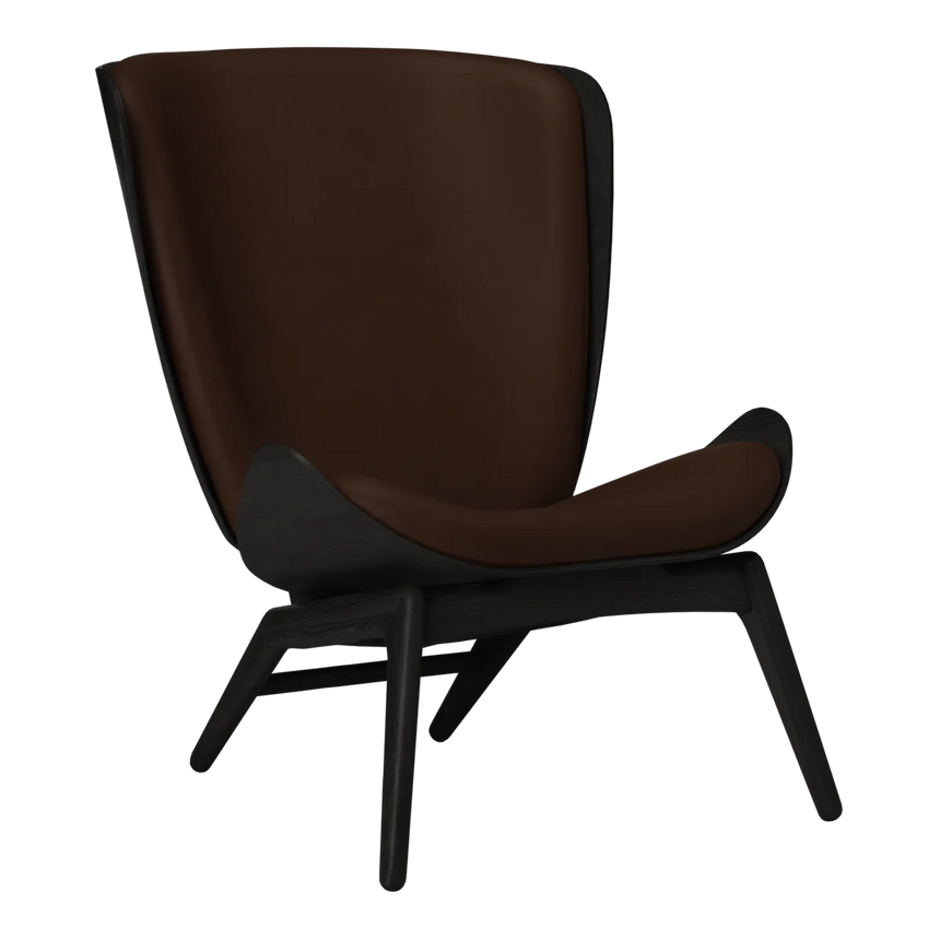 The Conversation Piece leather armchair with natural frame