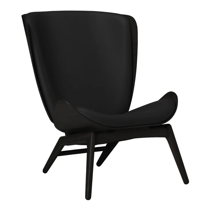 The Conversation Piece leather armchair with natural frame