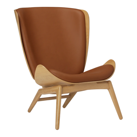 The Conversation Piece leather armchair with natural frame