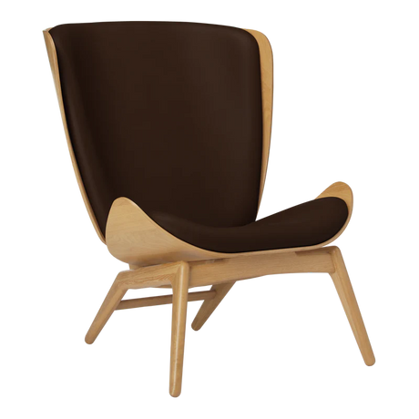 The Conversation Piece leather armchair with natural frame