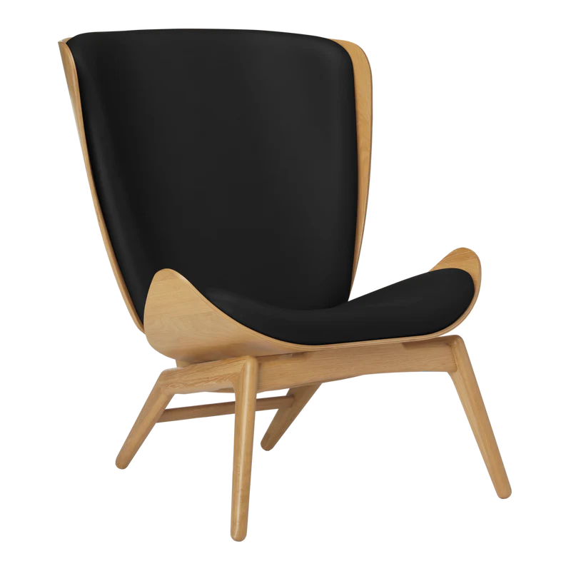 The Conversation Piece leather armchair with natural frame