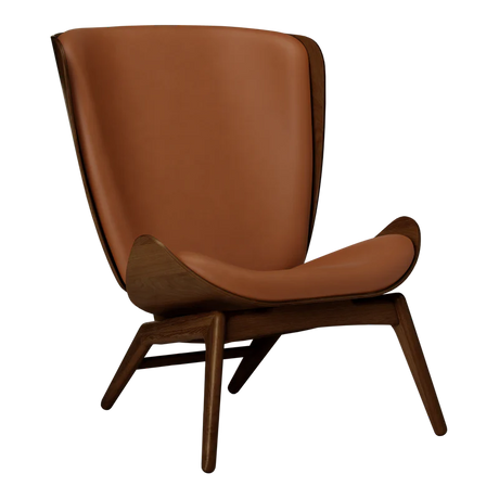 The Conversation Piece leather armchair with natural frame