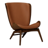 The Conversation Piece leather armchair with natural frame