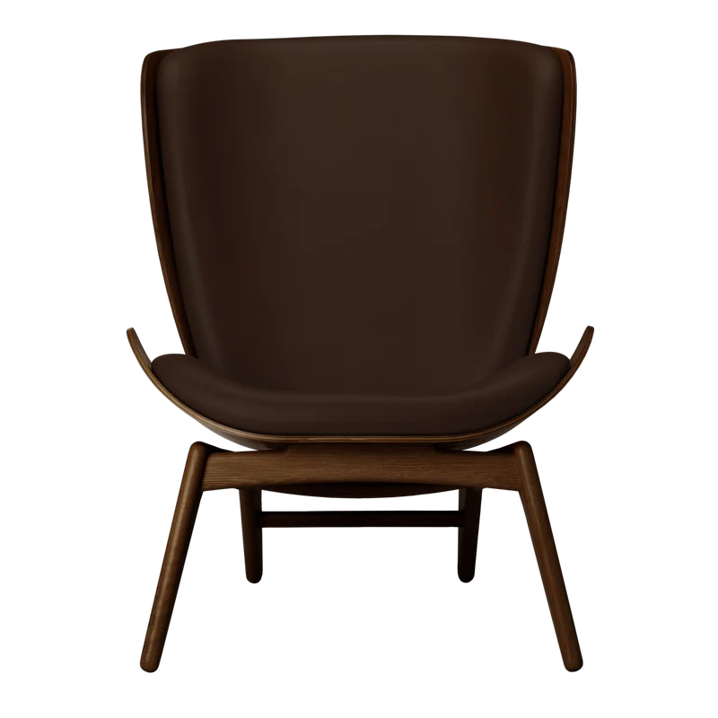 The Conversation Piece leather armchair with natural frame